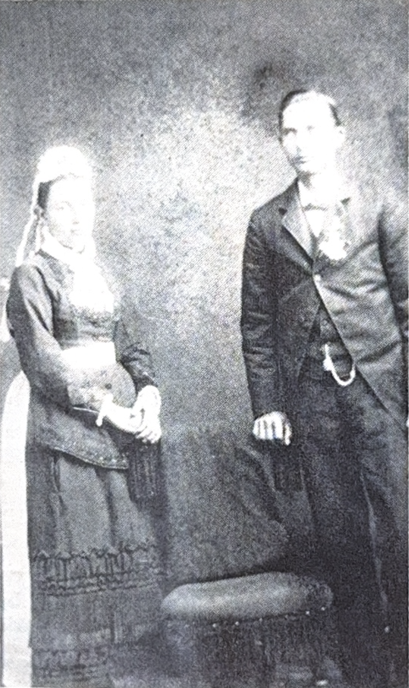 Formal portrait of a man and woman in Victorian-era clothing