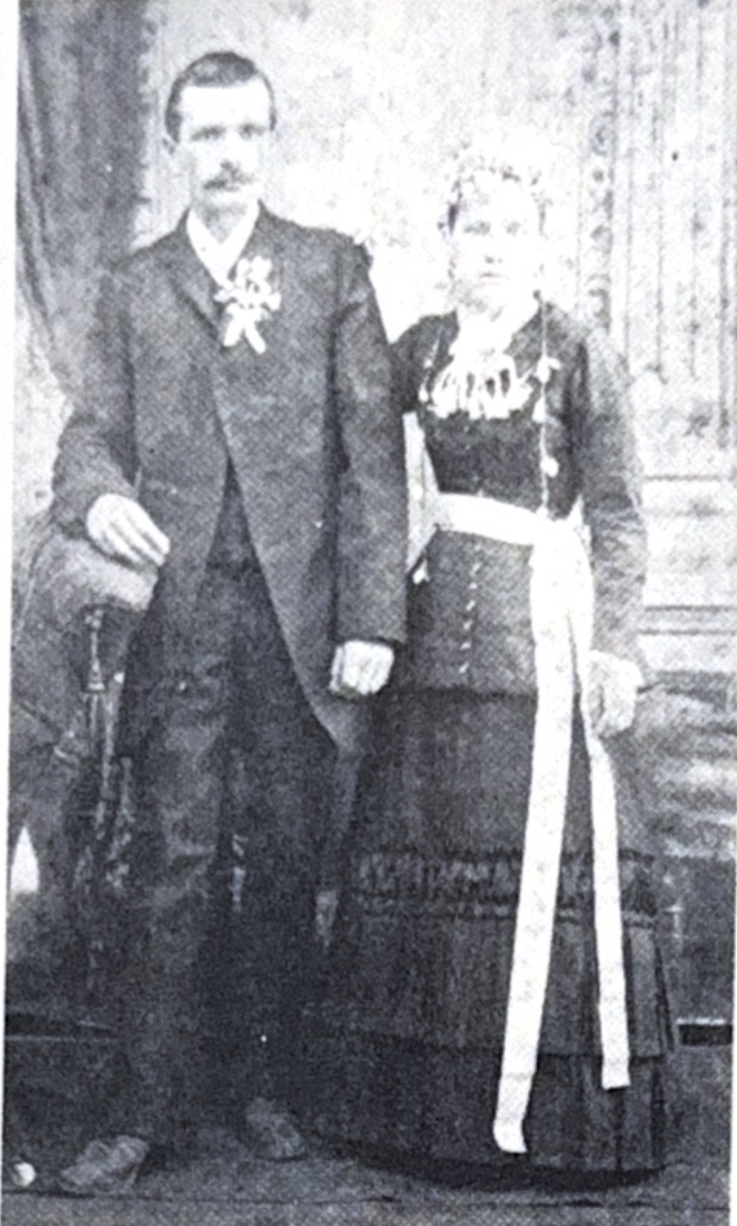 Formal portrait of a man and woman in Victorian-era clothing