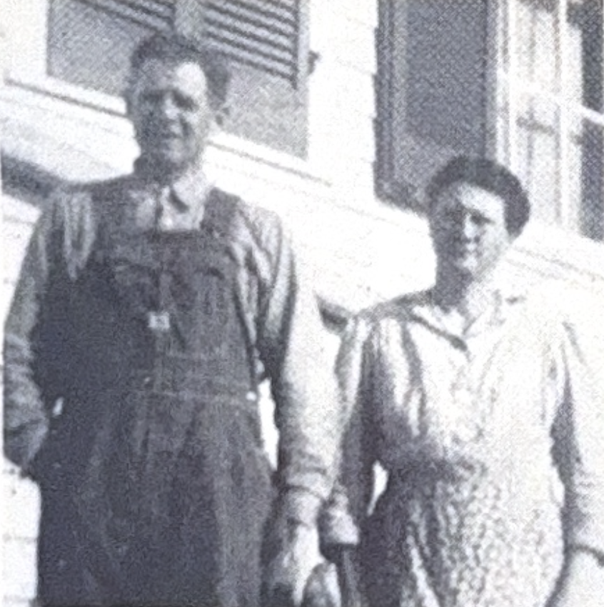 Photograph of two people standing together